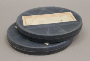 Two boxed vintage Pathe Scope Shell-Mex BP Ltd film reels. 17.5 cm diameter.