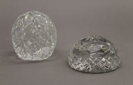 Two Irish crystal paperweights. The largest 8.5 cm high.