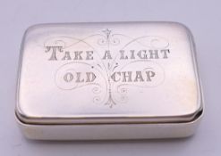 A Victorian silver vesta box inscribed to one side 'Take a Light Old Chap',