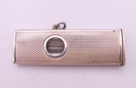 A silver cigar cutter, Birmingham 1960. 5 cm long. 13.9 grammes total weight.