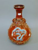 A Chinese red ground porcelain vase. 33.5 cm high.