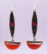 A pair of silver and cornelian Deco style earrings. 5 cm high.