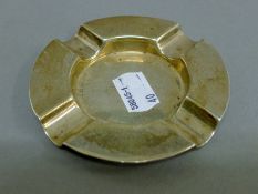 A silver ashtray, hallmarked Birmingham 1912. 9.5 cm diameter. 58.3 grammes.