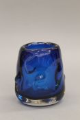 A Whitefriars style blue glass vase. 13 cm high.