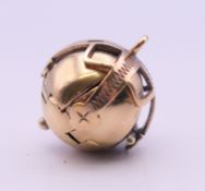 A 9 ct gold and silver Masonic ball pendant, opening into a flower. 1.5 cm high closed. 7.