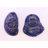 Two lapis pendants. The largest 4 cm high.