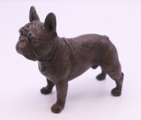 A bronze model of a French Bulldog. 7.5 cm long.