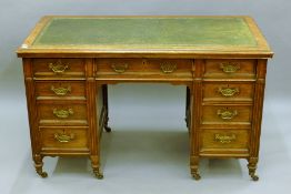 A Victorian oak desk. 126 cm long.