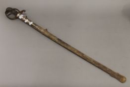 A sword in steel scabbard. 100 cm long.