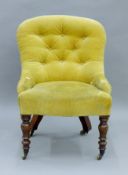 A Victorian green upholstered nursing chair. 51.5 cm wide.