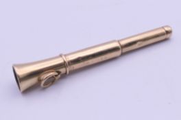 A 9 ct gold Sampson Mordan & Co cigar pricker. 7.5 cm long. 9.1 grammes total weight.