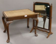 A caned stool and a dressing table mirror. The former 53 cm long.