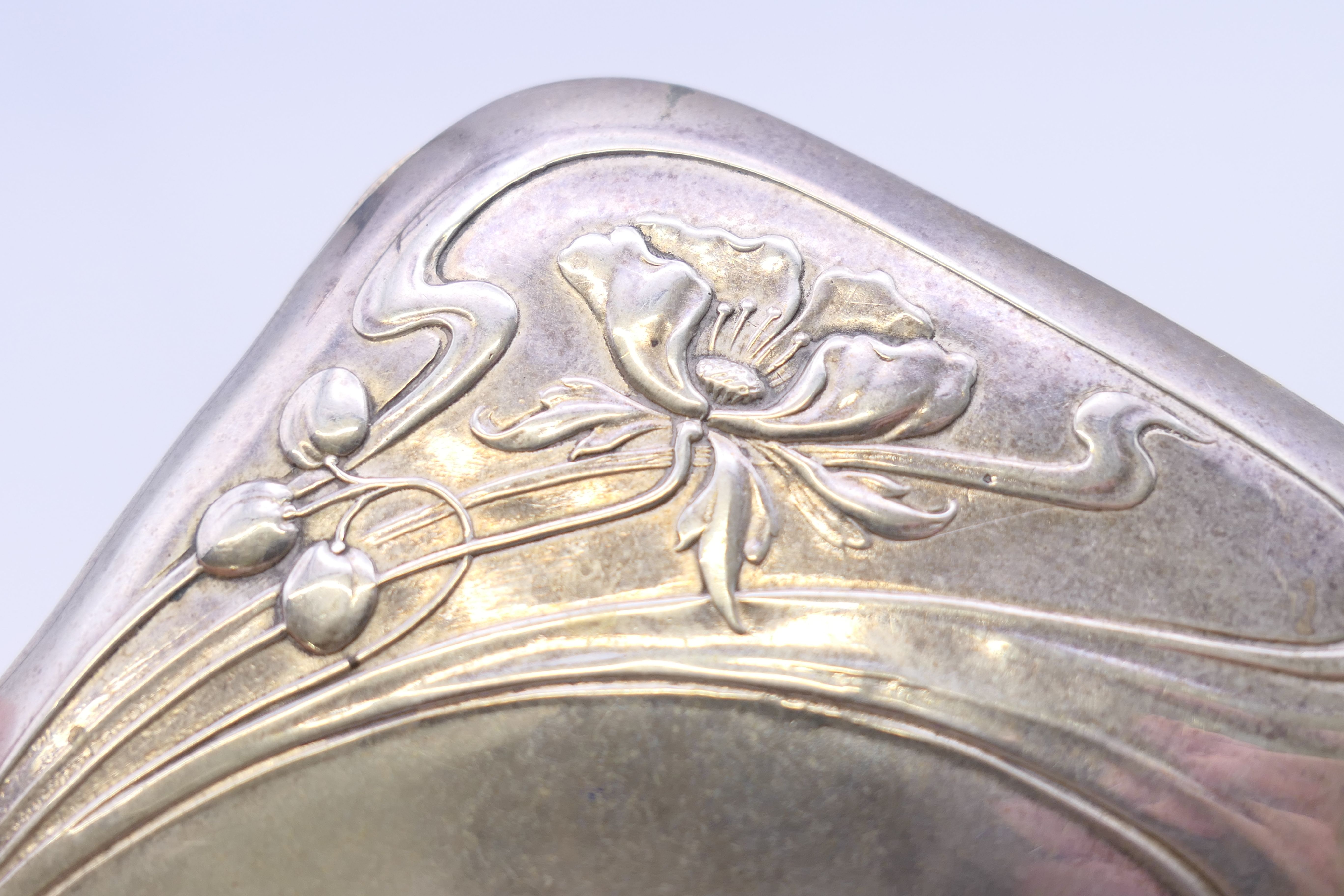 An Art Nouveau 800 silver cigarette case. 8 cm wide. 78.6 grammes total weight. - Image 6 of 8
