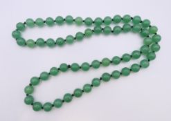 A bead necklace. 70 cm long.