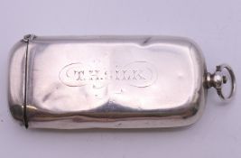 A Victorian silver vesta/single sovereign case, inscribed T H SILK, Chester 1890. 6.5 cm wide. 32.