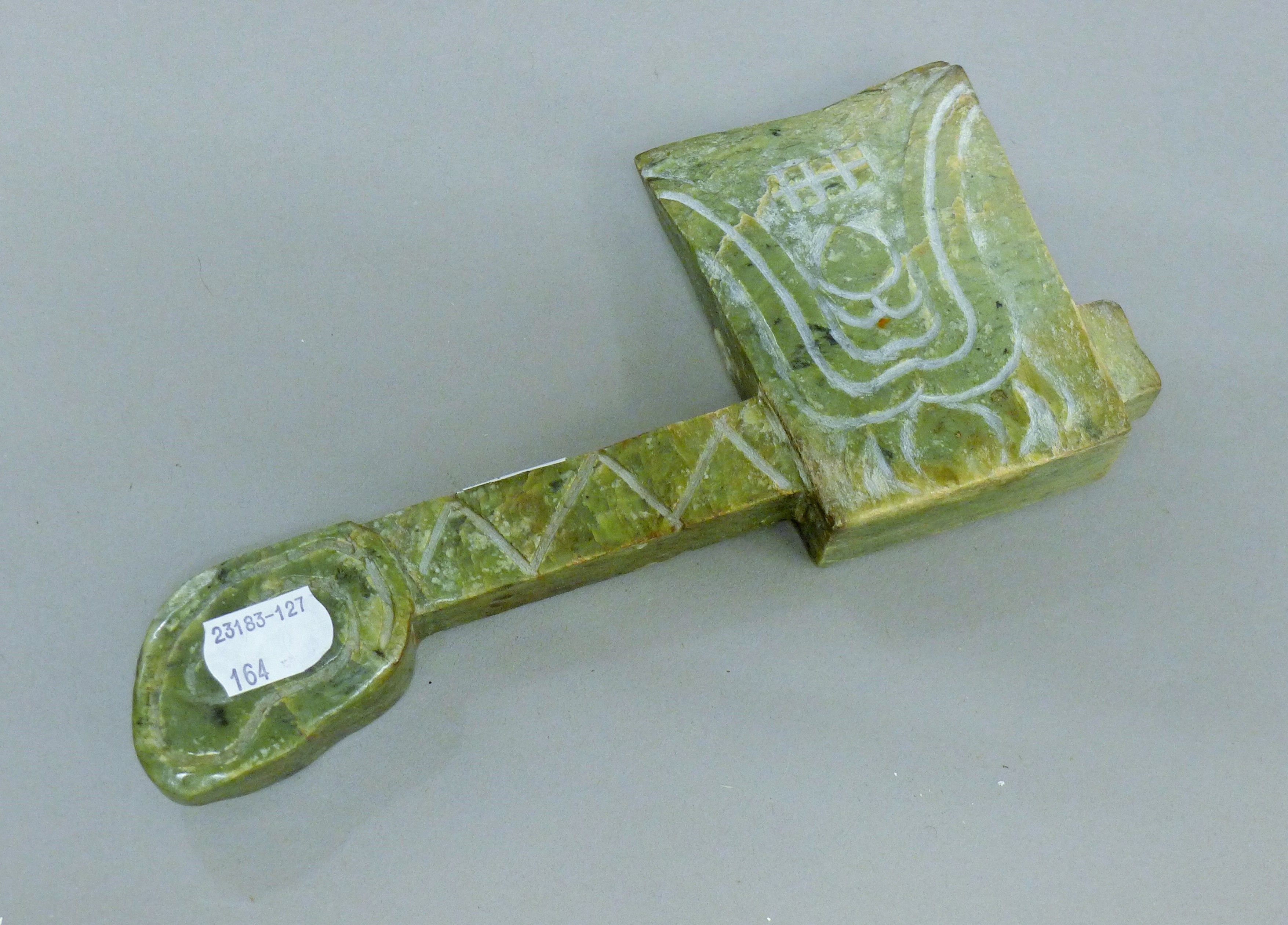 A Chinese carved hardstone axe. 22.5 cm long. - Image 2 of 2