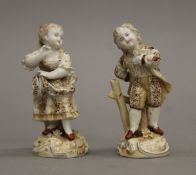 Two 19th century Continental porcelain figurines. The largest 9 cm high.