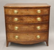 A George III mahogany bow front chest of drawers. 101 cm wide.