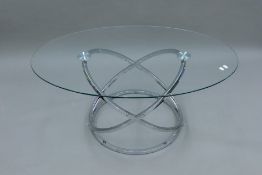 A modern glass top coffee table. 109 cm long.