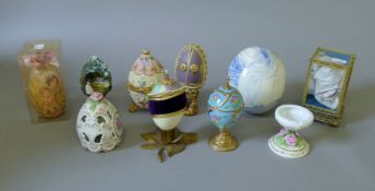 A quantity of various decorative model eggs.