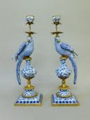 A pair of blue and white bird form candlesticks. 48 cm high.
