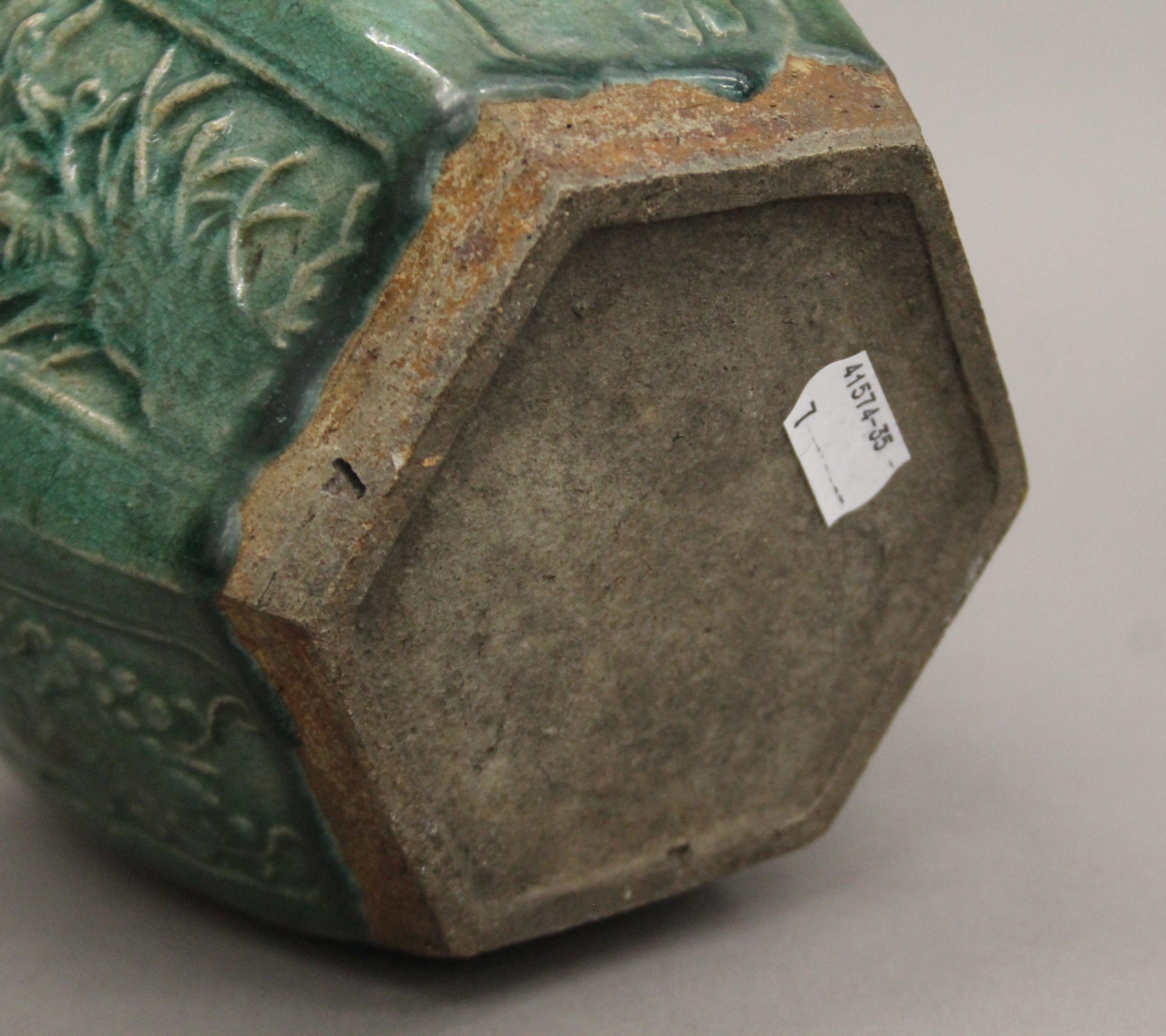 A Chinese green glazed jar, with panels of floral and calligraphy decoration. 14.5 cm high. - Image 5 of 5
