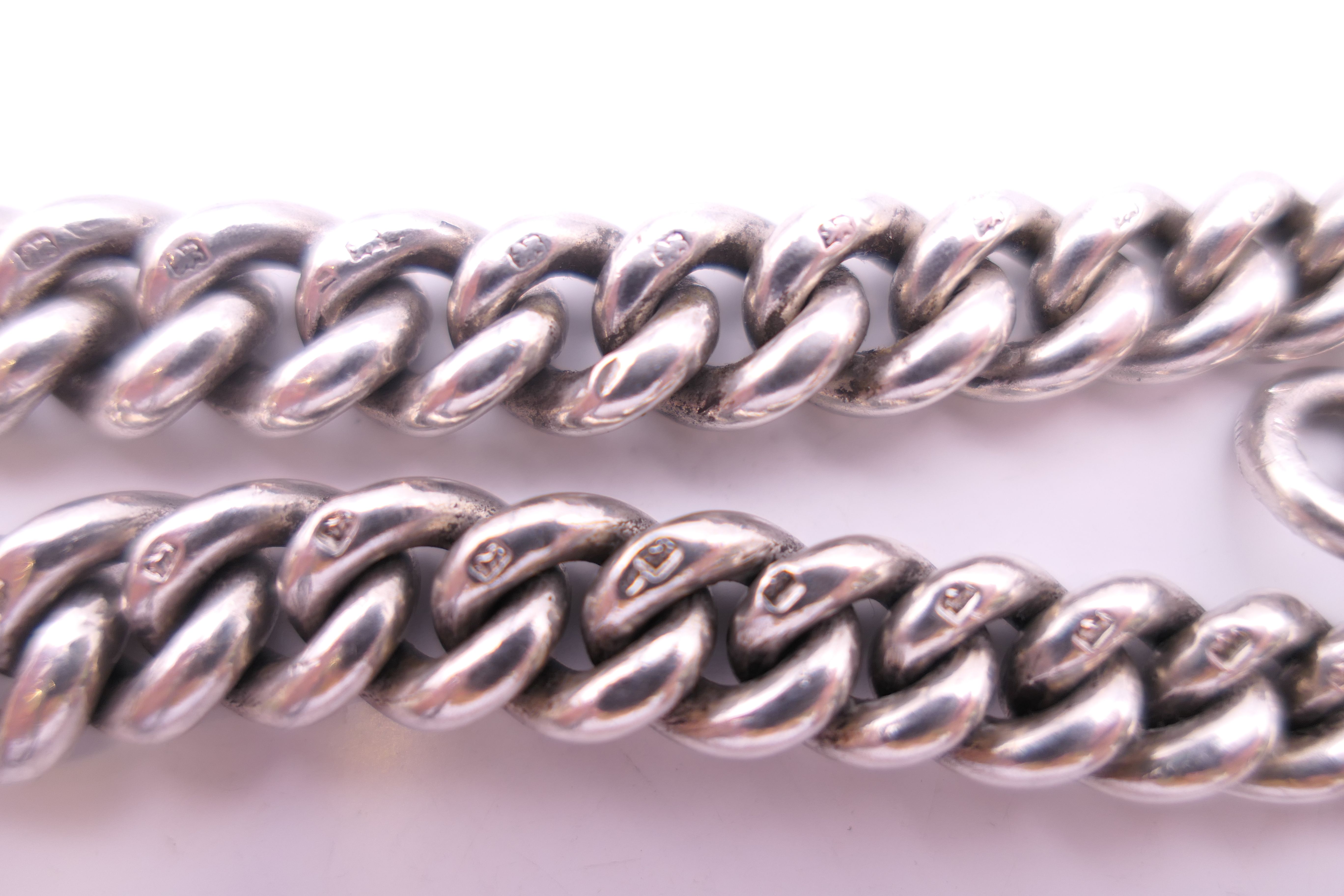 A silver watch chain. 60 cm long. 173.1 grammes. - Image 4 of 9