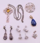 A collection of silver jewellery items.