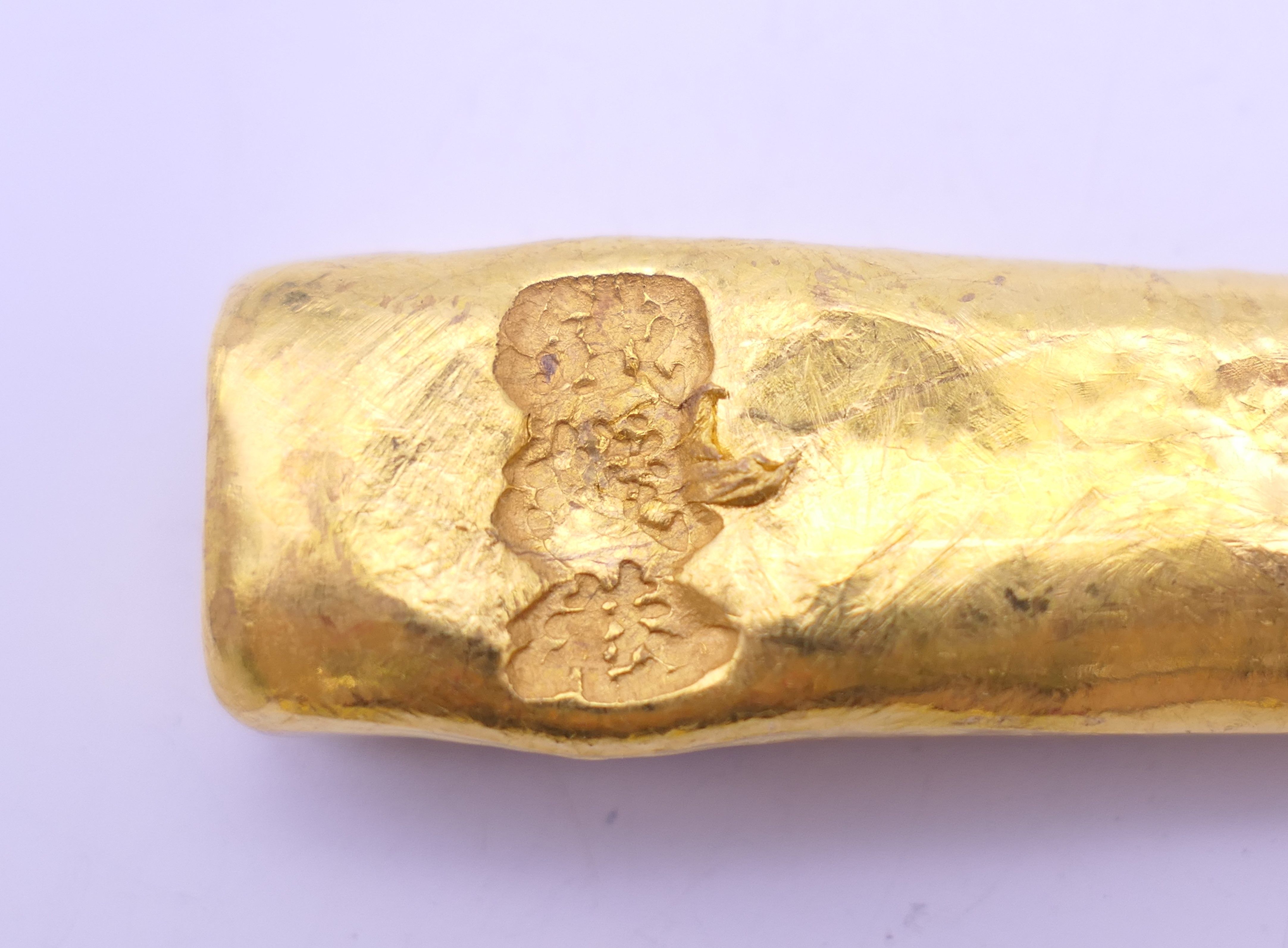 Three Chinese gold coloured bar scroll weights. The largest 12 cm long. - Image 7 of 8