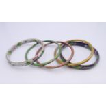 Five cloisonne bangles. Each approximately 6.5 cm inner diameter.