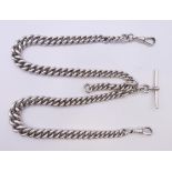 A silver watch chain. 60 cm long. 173.1 grammes.