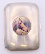 A silver cigarette case decorated with a horse. 6 cm wide.