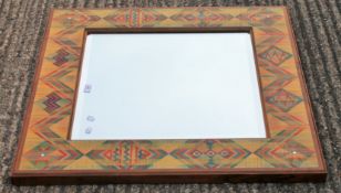A modern stained wooden wall mirror. 88 cm square.
