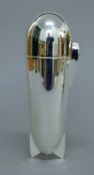 A silver plated zeppelin formed cocktail shaker. 23.5 cm high.