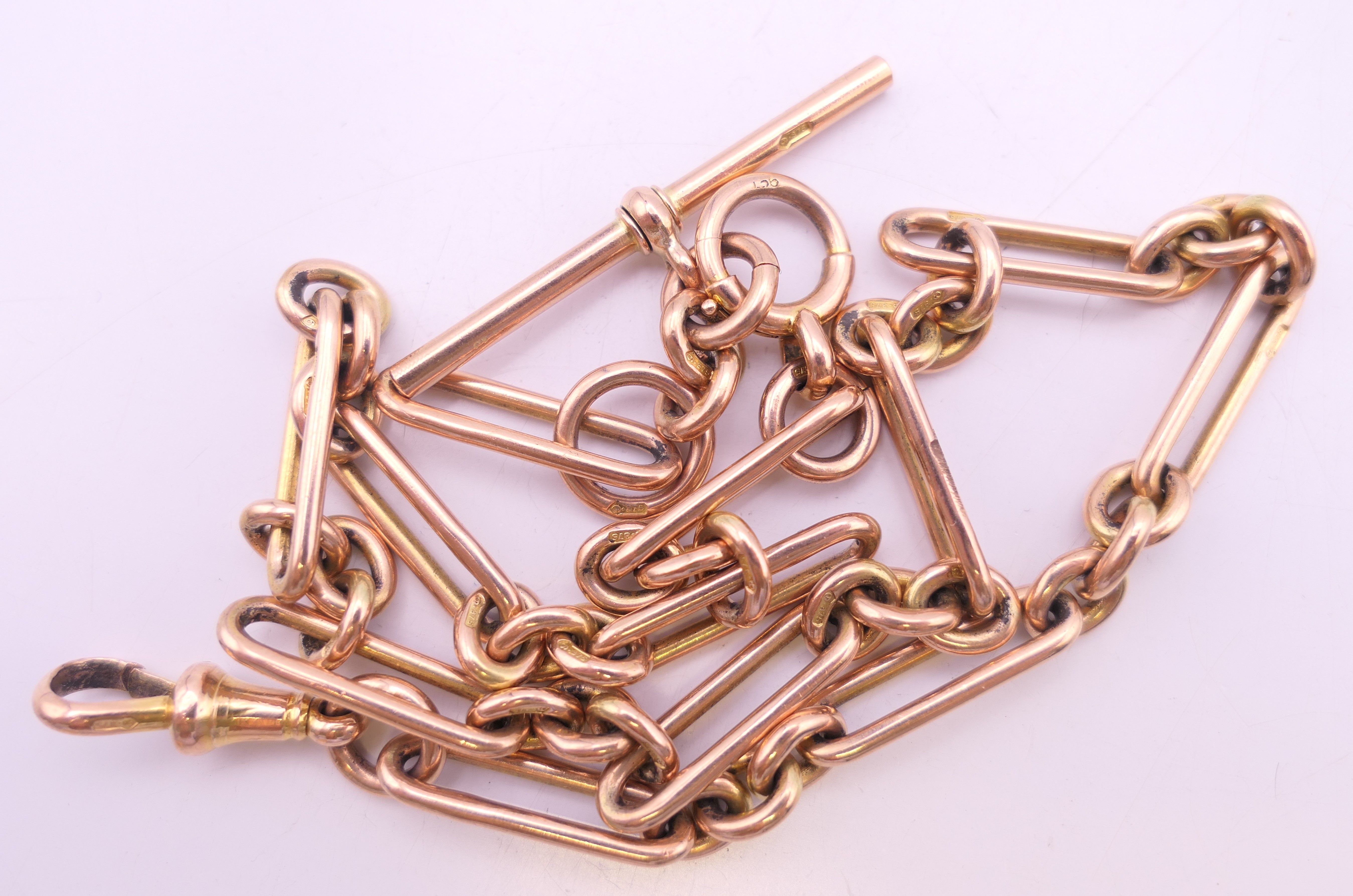 A 9 ct gold paperclip and link watch chain. 40.5 cm long. 38.4 grammes. - Image 2 of 5