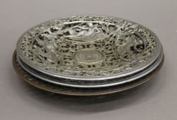 Three Coalbrookdale pierced decorative dishes. The largest 21.5 cm diameter.