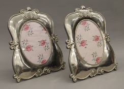 A pair of silver plated photograph frames. 38 cm high.