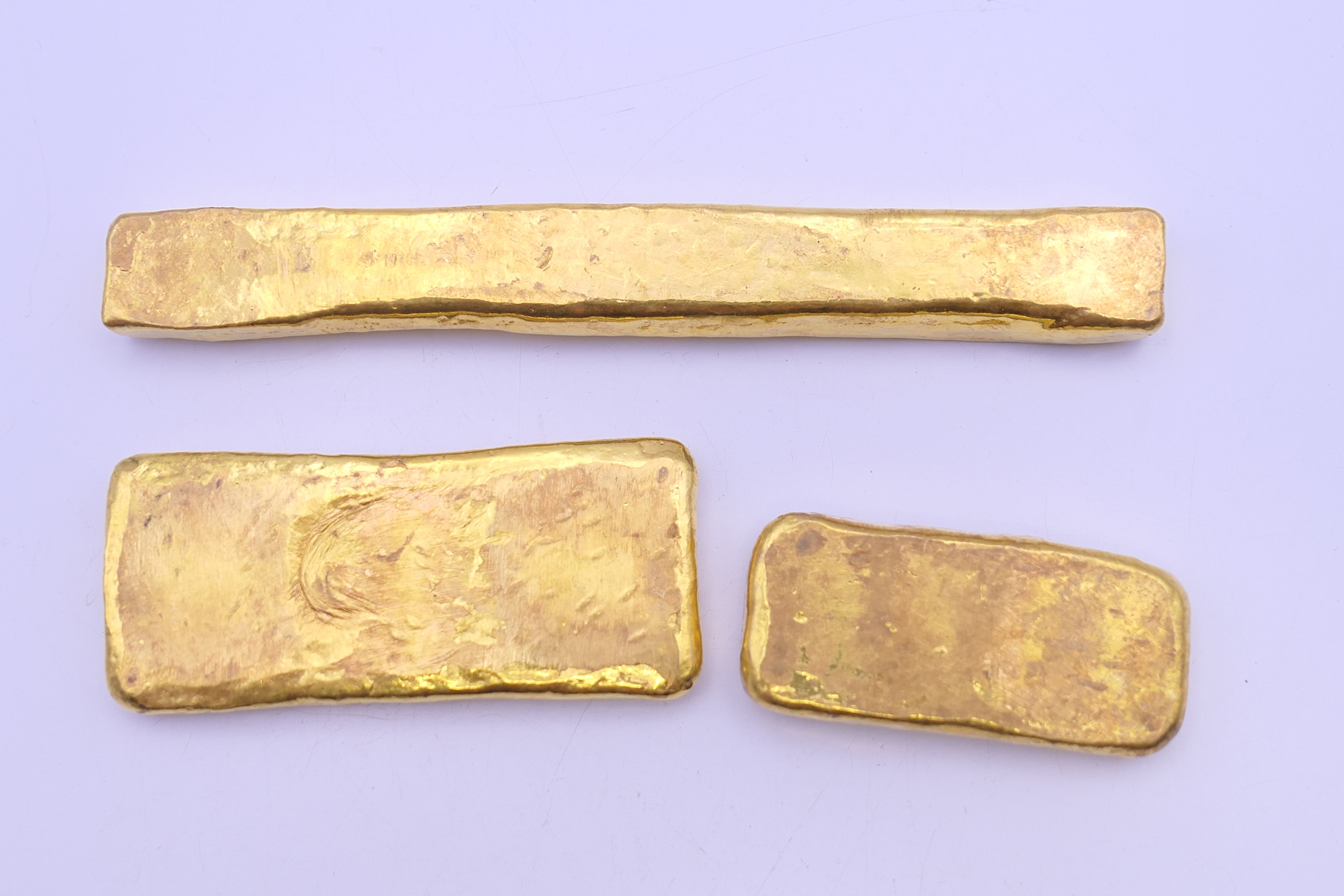 Three Chinese gold coloured bar scroll weights. The largest 12 cm long. - Image 2 of 8