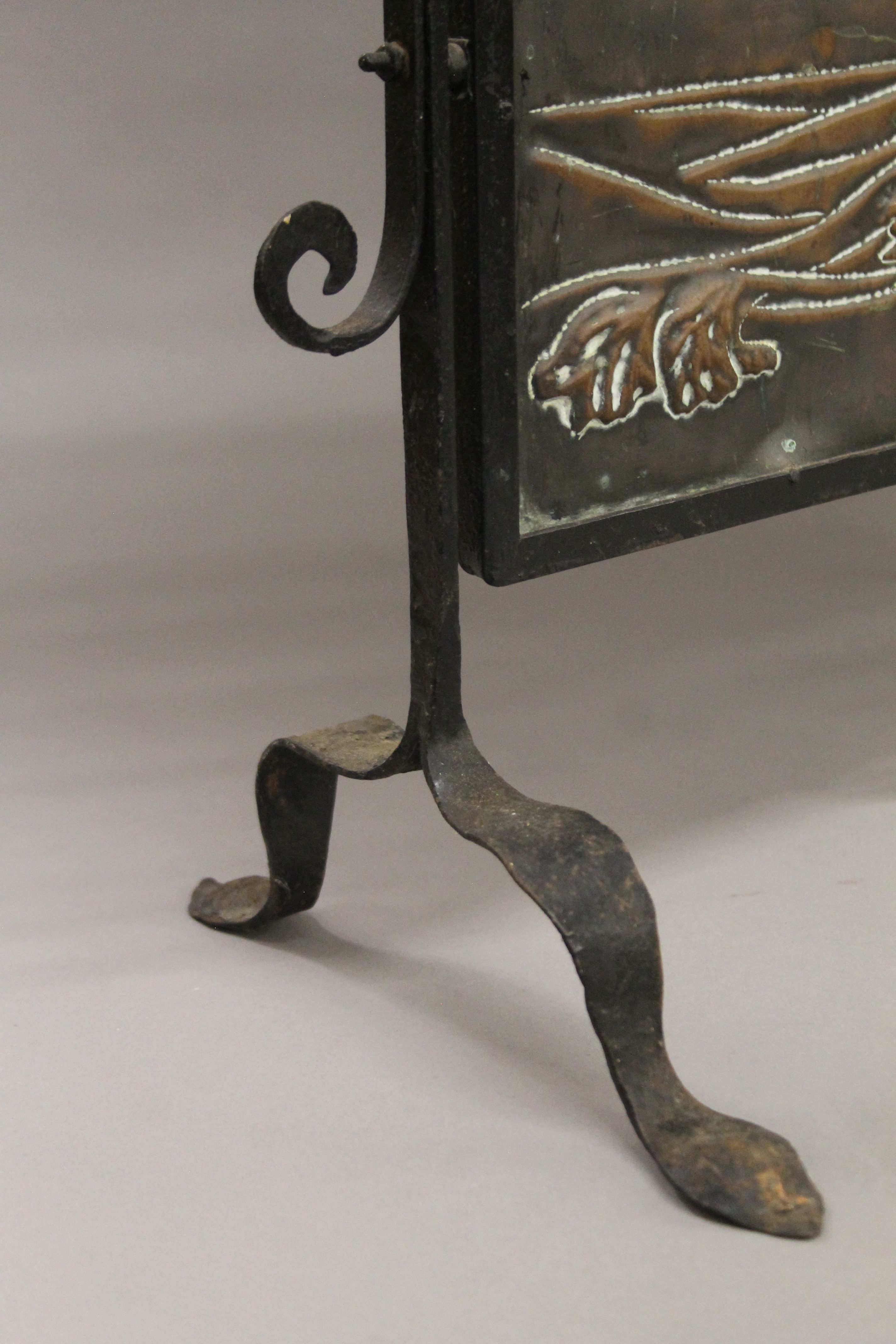 An Arts and Crafts copper and wrought iron fire screen depicting a galleon. 65 cm wide. - Image 4 of 4