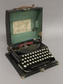 A boxed Remington portable typewriter. 30 cm wide.