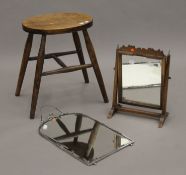 A 19th century toilet mirror, a stool and a wall mirror. The former 27.5 cm wide.