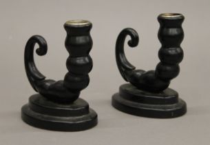 A pair of cornucopia candlesticks. 12 cm high.