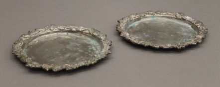 A pair of silver plated coasters. 15 cm diameter.