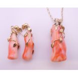 A coral pendant and matching earrings, set in 9 ct gold with a 9 ct gold chain. Pendant 4.