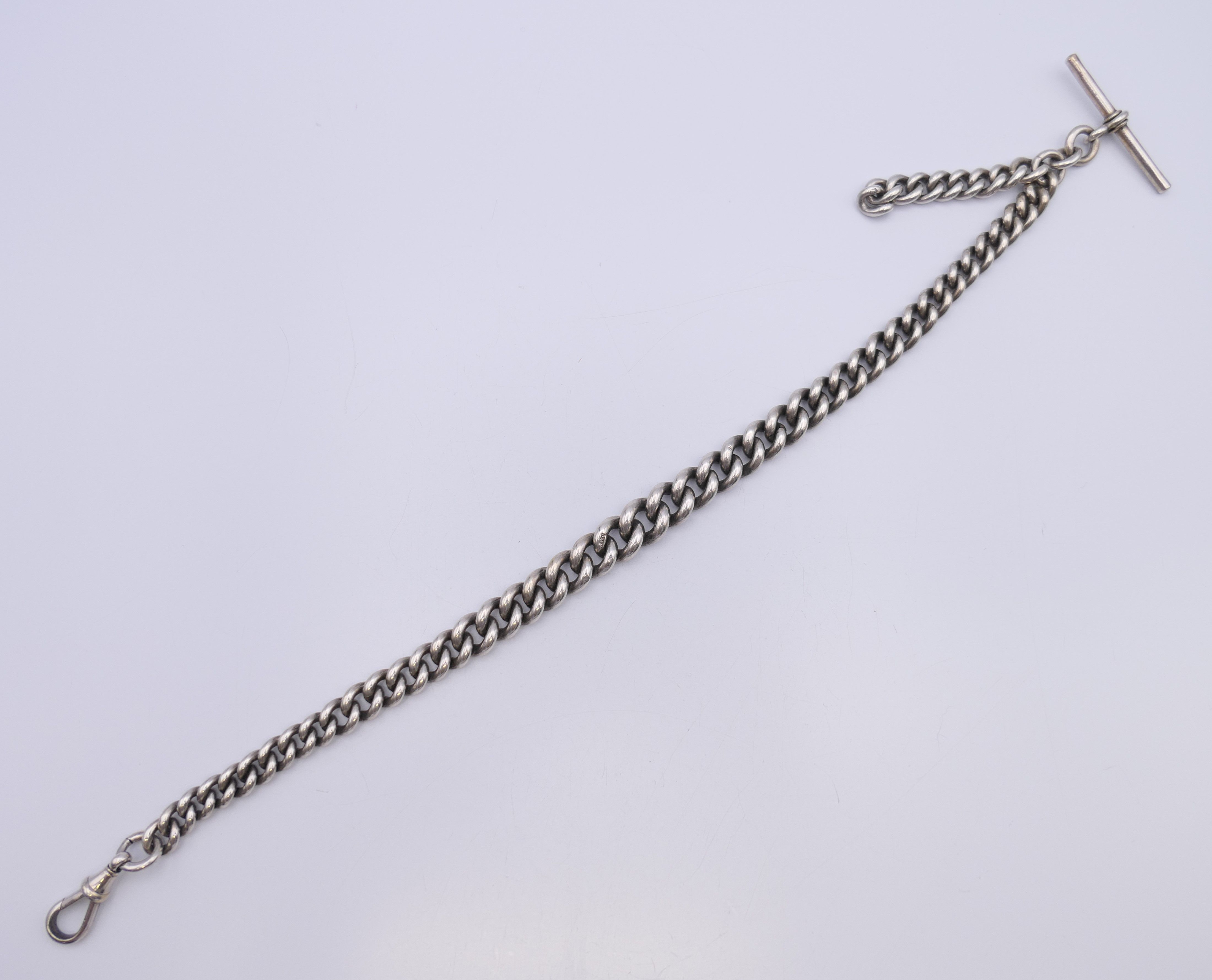A silver watch chain. 34.5 cm long. 77.4 grammes. - Image 2 of 8