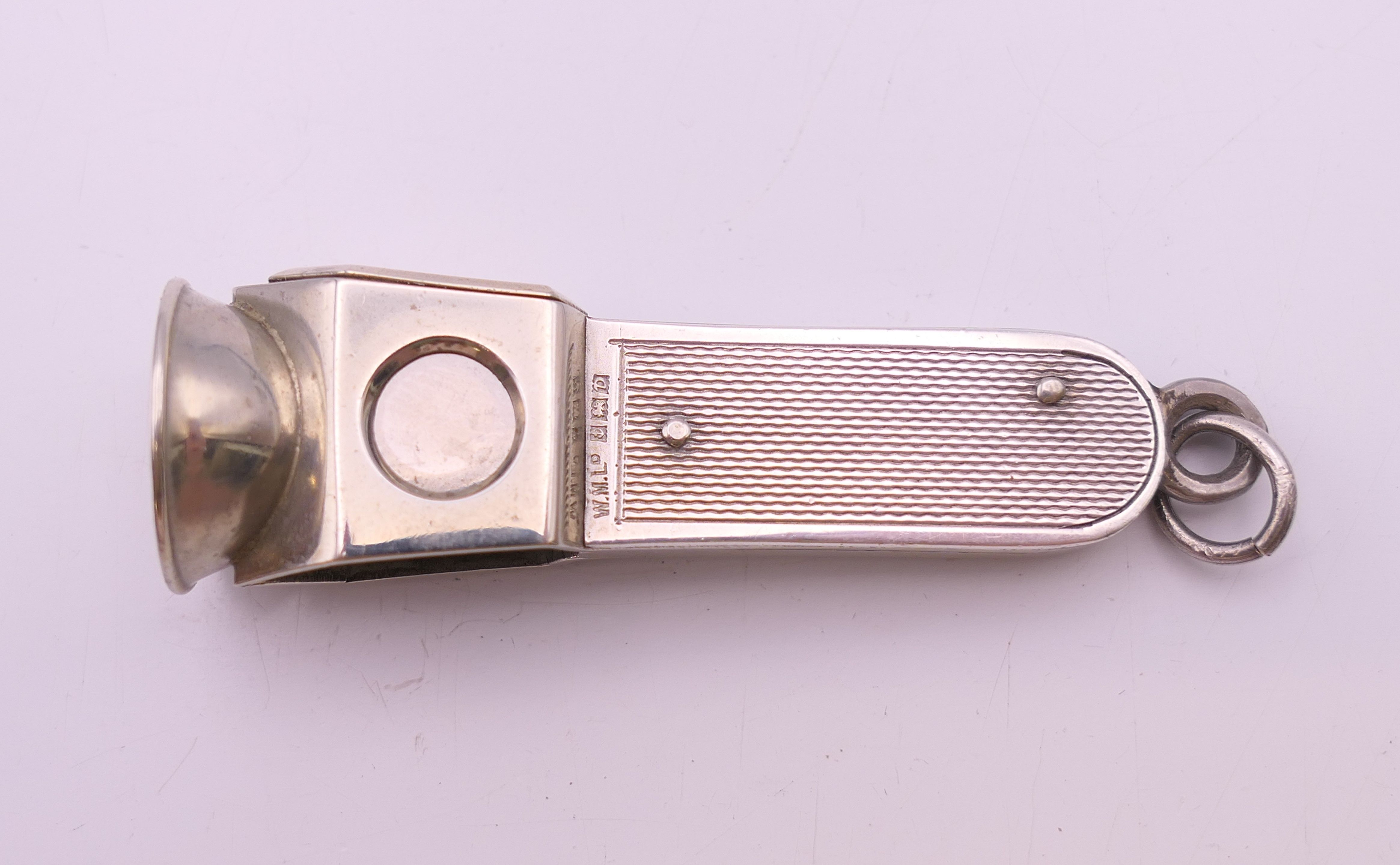 A silver cigar cutter. 6 cm long. 25.9 grammes total weight. - Image 2 of 6