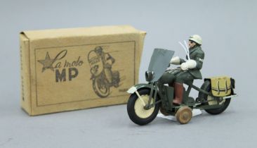 A La Moto clockwork model of a Military Police Officer on a motorbike, boxed. 12 cm long.