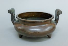 A Chinese unmarked silver inlaid bronze censer. 26 cm wide.