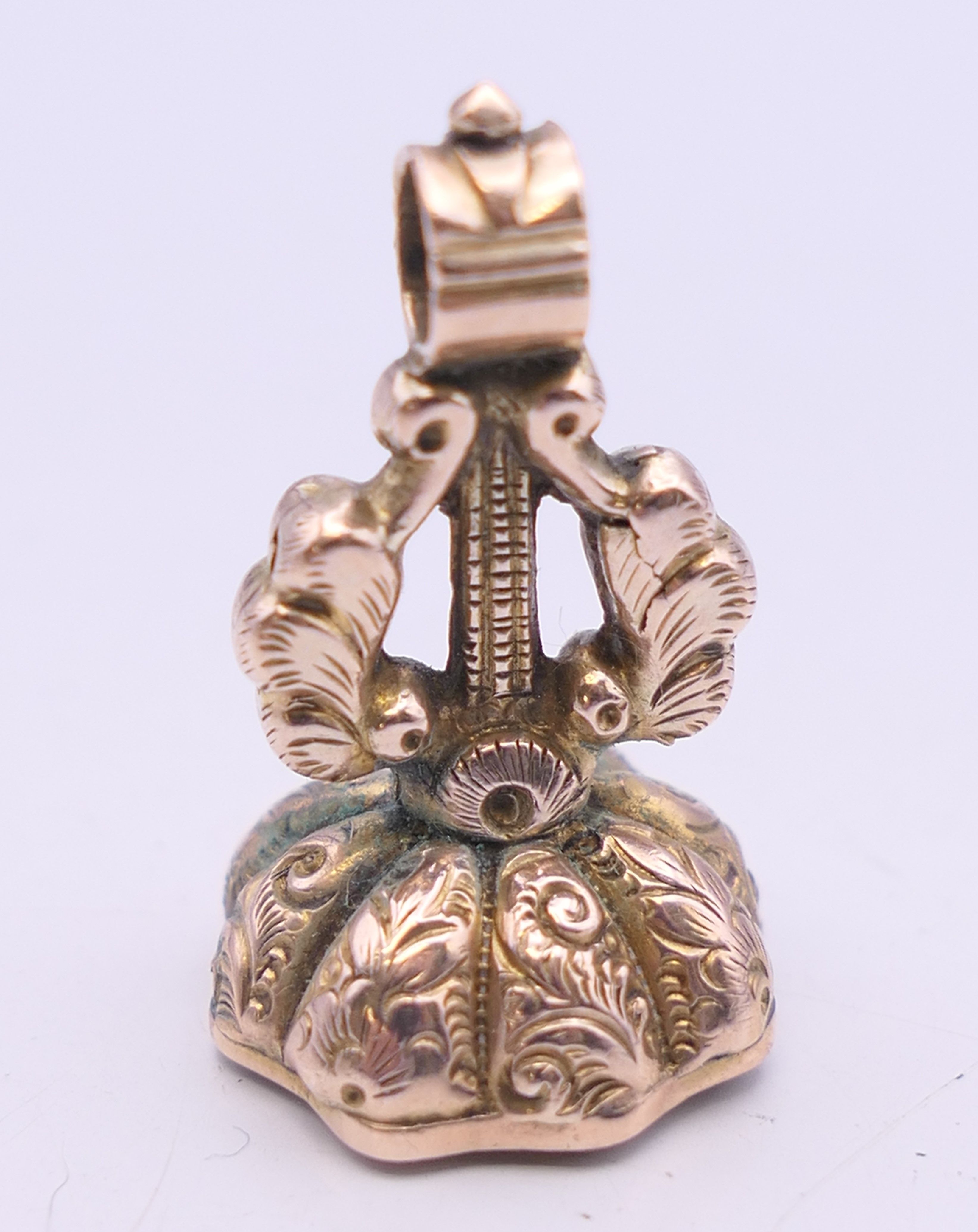 A 9 ct gold fob with citrine engraved with ship. 2.5 cm high. 3. - Image 4 of 5