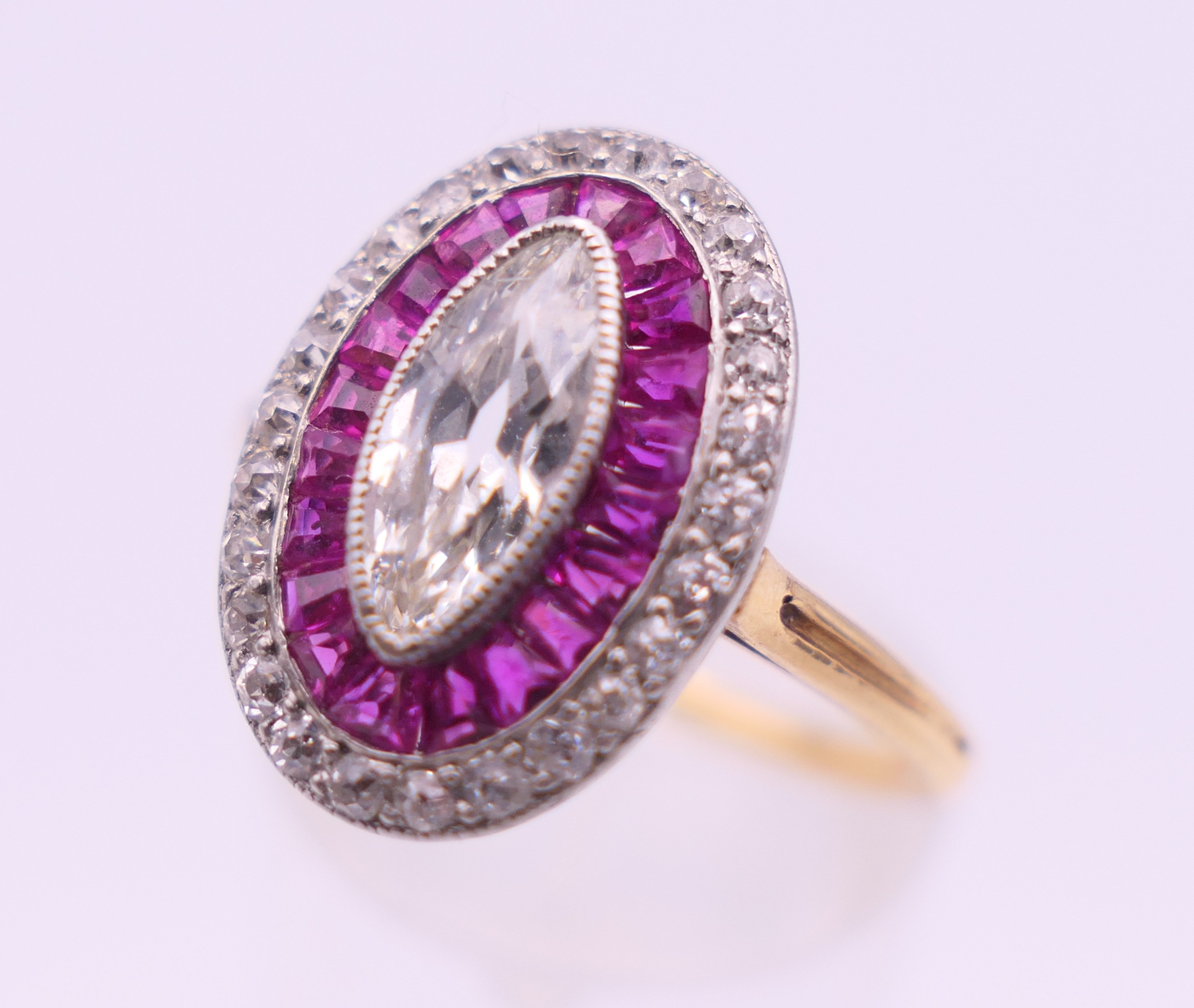 An unmarked 18 ct gold diamond and ruby ring, the central stone 9 mm high. Ring size O. 4. - Image 5 of 6